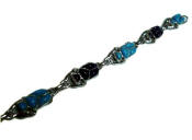 Scarab bracelet in 900 silver with inlaid stones.