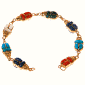 Scarab bracelet in 18k gold with inlaid stone