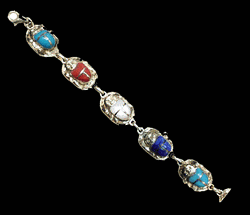 Silver scarab bracelet inlaid with stones